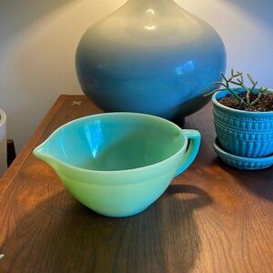 Fire King Jadeite batter bowl in “Colonial” pattern.